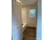 A simple bathroom featuring hard surface floors, a tub, and a window at 238 Fairchase Cir # 54, Stony Point, NC 28678