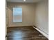 A simply decorated bedroom with a window that provides plenty of natural light at 238 Fairchase Cir # 54, Stony Point, NC 28678