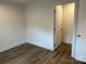 Bedroom featuring hard surface floors and an open door at 238 Fairchase Cir, Stony Point, NC 28678