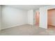 This is a standard bedroom layout, complete with closet and doorway to the rest of the home at 2513 Crimson Way, Monroe, NC 28112