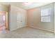 A standard bedroom design with ample lighting and a closet for storage at 2513 Crimson Way, Monroe, NC 28112