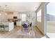 Kitchen flows into dining area with slider to backyard at 2513 Crimson Way, Monroe, NC 28112