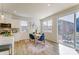 Kitchen flows into dining area with slider to backyard at 2513 Crimson Way, Monroe, NC 28112