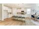 Stylish kitchen featuring a large island with bar seating, modern appliances, and bright, open layout at 2513 Crimson Way, Monroe, NC 28112