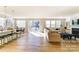 Spacious open-concept living area featuring a modern kitchen, dining space, and comfortable living room setup at 2513 Crimson Way, Monroe, NC 28112