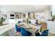Open floor plan of dining, kitchen, and living spaces in a home at 2513 Crimson Way, Monroe, NC 28112