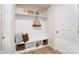 Mudroom featuring storage bench with hooks and cubbies at 2513 Crimson Way, Monroe, NC 28112