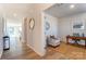 A cozy home office displays a functional layout with a desk and chair, perfect for remote work at 2513 Crimson Way, Monroe, NC 28112