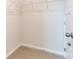 Well-organized walk-in closet features ample storage and an adjustable wire shelving system at 2513 Crimson Way, Monroe, NC 28112