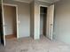 Bedroom showcasing closet, neutral carpet, and view to another room at 252 Fairchase Cir # 56, Stony Point, NC 28678