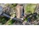 Birds eye view of the house showing roof, driveway and spacious backyard and mature trees at 2537 Wood Star Ct, Matthews, NC 28105