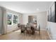 Dining room with hardwood floors, natural light, and neutral paint at 2537 Wood Star Ct, Matthews, NC 28105