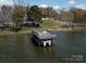 This waterfront home features a private boat dock with an upper deck for lake views at 254 N Shoreline N Dr # 38, New London, NC 28127