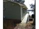 Side exterior of home with siding, and a view of the lake at 254 N Shoreline N Dr # 38, New London, NC 28127
