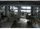 Living room with lake views from the sliding glass doors and hardwood floors at 254 N Shoreline N Dr # 38, New London, NC 28127