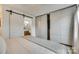 Main bedroom featuring double closets and sliding barn door to ensuite bathroom at 2944 Beech Nut Rd, Charlotte, NC 28208