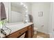 Bathroom with vanity, toilet and a well-lit mirror at 3216 Bridgewick Rd, Waxhaw, NC 28173