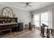 Unique living room featuring a custom wet bar with a piano, wine racks, and accent lighting at 3216 Bridgewick Rd, Waxhaw, NC 28173