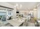Dining area next to the screened-in porch, seamlessly connecting indoor and outdoor living spaces at 4023 Gozzi Dr, Iron Station, NC 28080
