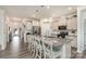 Modern kitchen with stainless steel appliances, a large island with seating, and an open layout at 4023 Gozzi Dr, Iron Station, NC 28080