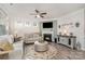 Open living room with fireplace and stylish furniture at 4023 Gozzi Dr, Iron Station, NC 28080