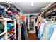 This closet includes metal racks and shelves for storing clothes, shoes, and other personal items at 5304 Woodridge Dr, Monroe, NC 28110