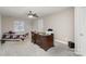 Bedroom with a ceiling fan, a bed with floral pattern and a wooden desk at 6622 Cedar Cliff Dr, Charlotte, NC 28216