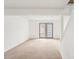 Basement showcasing neutral carpet, recessed lighting, and French doors at 7344 Pebblestone Dr # E, Charlotte, NC 28212