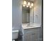 Bathroom with white vanity, sink, and chrome hardware at 7702 Brisbane Ct, Charlotte, NC 28215