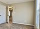 This bedroom features neutral paint, carpet flooring, and bright windows at 7702 Brisbane Ct, Charlotte, NC 28215