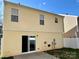 This exterior features a sliding glass door to a patio at 7702 Brisbane Ct, Charlotte, NC 28215