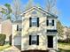 Charming two-story home with black shutters and a well-manicured lawn at 7702 Brisbane Ct, Charlotte, NC 28215