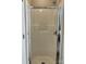 This shower has a glass door and chrome hardware at 7702 Brisbane Ct, Charlotte, NC 28215