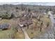 An aerial view of a single-Gathering home featuring a long driveway and an attached two-car garage at 821 Cabaniss Dr, Shelby, NC 28150