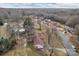 An aerial view of a single-Gathering home featuring a well-manicured lawn and mature trees in the yard at 821 Cabaniss Dr, Shelby, NC 28150