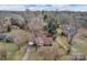 Aerial view of a charming home nestled among mature trees at 821 Cabaniss Dr, Shelby, NC 28150