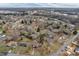 An aerial view of a residential neighborhood showcasing a mix of homes and tree-lined streets at 821 Cabaniss Dr, Shelby, NC 28150