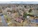 An aerial view of a neighborhood featuring a variety of single-Gathering homes with mature trees at 821 Cabaniss Dr, Shelby, NC 28150