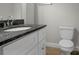 Bathroom featuring a granite vanity top at 821 Cabaniss Dr, Shelby, NC 28150