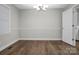Bright dining room with hardwood floors, and a modern chandelier at 821 Cabaniss Dr, Shelby, NC 28150