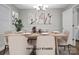 Elegant dining room with a wooden table set for dinner and decorative wall art at 821 Cabaniss Dr, Shelby, NC 28150