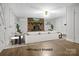 Virtually staged living room highlighting a brick fireplace, comfortable seating, and contemporary décor enhancing the home's appeal at 821 Cabaniss Dr, Shelby, NC 28150