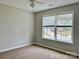 Bedroom featuring two windows and carpeted flooring at 8812 Glenover Cir, Charlotte, NC 28269