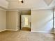 Spacious bedroom with carpeted flooring and tray ceiling at 8812 Glenover Cir, Charlotte, NC 28269
