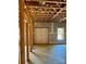 Unfinished basement with exposed rafters and a double door at 0 6Th Nw St, Hickory, NC 28601