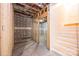 Unfinished basement with framed walls, ductwork, and stairs ready for customization at 0 6Th Nw St, Hickory, NC 28601