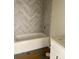 Bathroom with tub and tiled walls at 0 6Th Nw St, Hickory, NC 28601