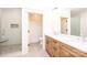 Modern bathroom featuring double vanity, glass shower, and neutral color palette at 0 6Th Nw St, Hickory, NC 28601