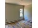 Bedroom with a window, painted walls, and protective covering on the floors at 0 6Th Nw St, Hickory, NC 28601