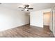 Bedroom with wood-look flooring, neutral wall color, and a ceiling fan at 0 6Th Nw St, Hickory, NC 28601